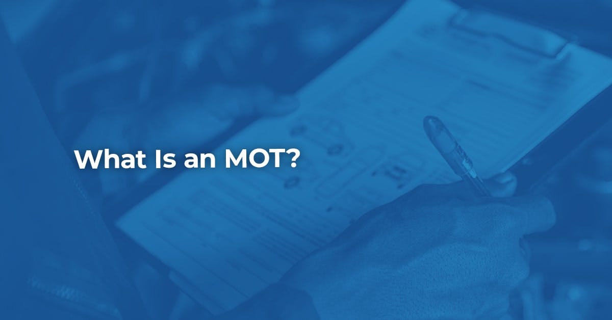 The article title over an MOT tester looking at a checklist on their clipboard, in a blue overlay. 