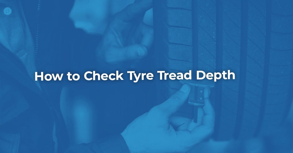 The article title over someone checking the tyre tread depth on their car.