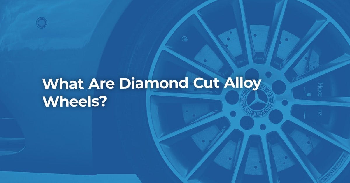The article title over a blue overlay with a diamond cut alloy wheel.