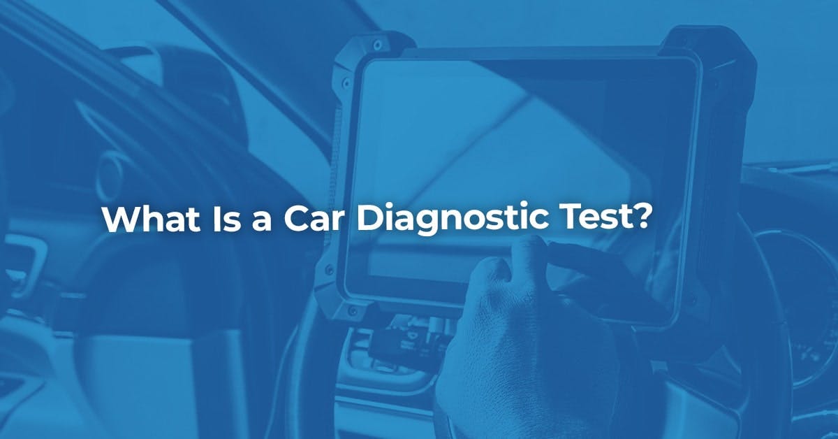 The article title over someone carrying out a diagnostic test on a car.