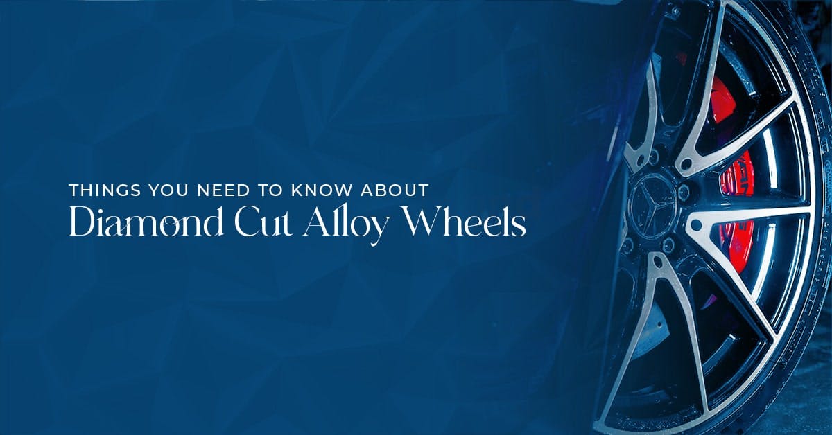 The article title over a blue overlay with a diamond cut alloy wheel with a red brake caliper. 