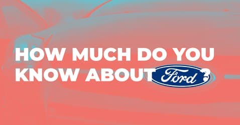 The article title over the front of a Ford car, in a pink and blue overlay.