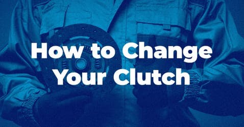 mechanic holding clutch disc and making a thumbs up gesture with blog title and blue overlay on top