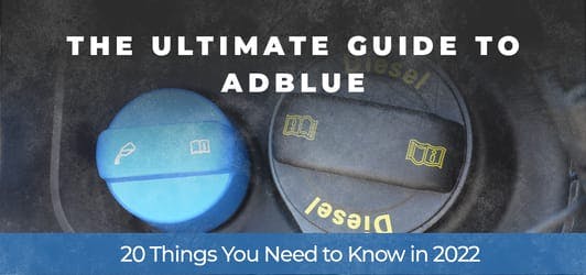The article title over the AdBlue cap and fuel cap in a car, in a grey overlay.