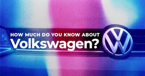 The article title over a Volkswagen car bumper, with a red and blue overlay.