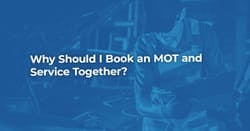 The article title over a mechanic with a clipboard carrying our an MOT and service.