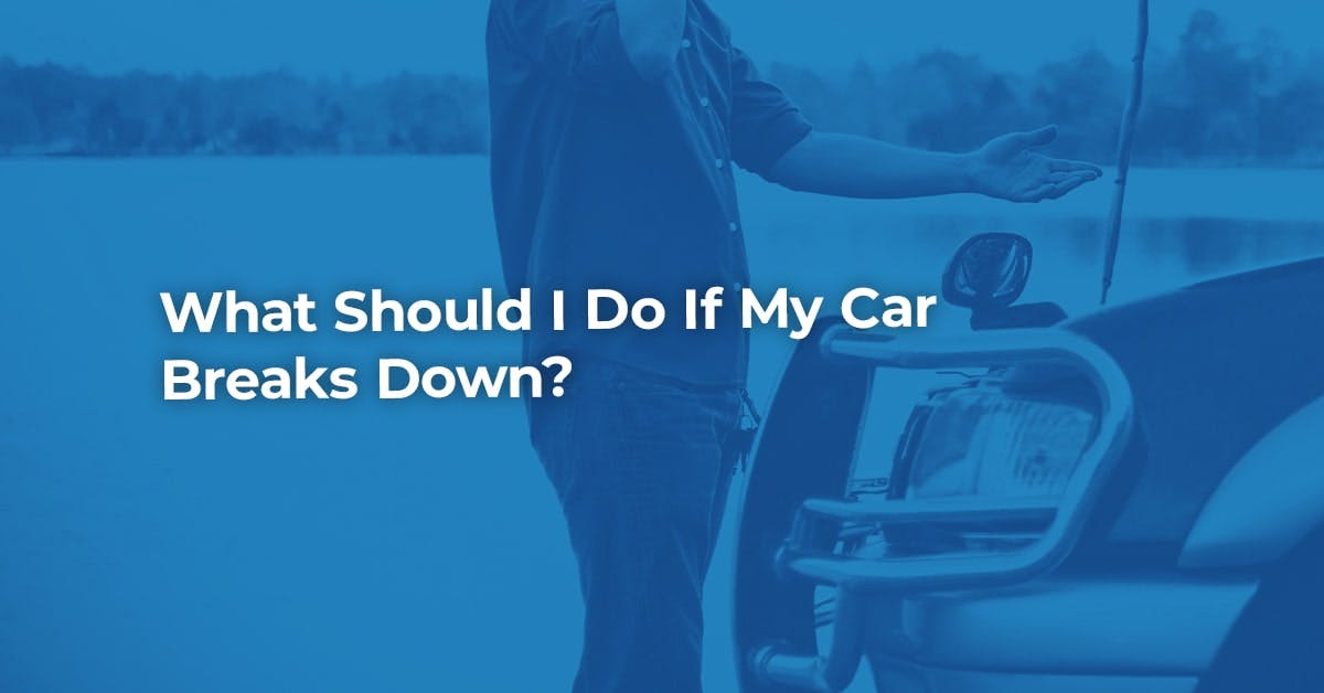The article title over a man leaning over the bonnet of his car, on the phone to breakdown recovery.