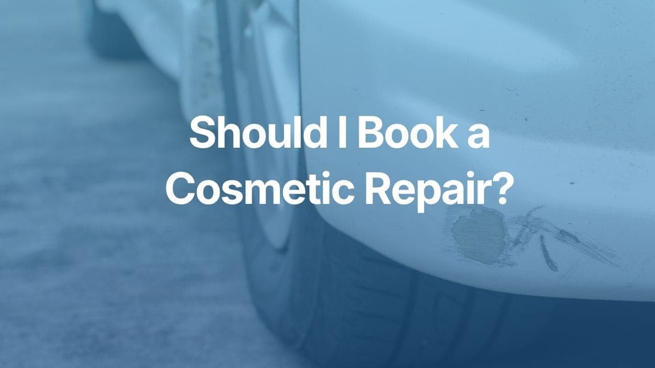 The article title over a scratched car.