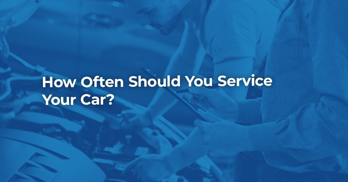 The article title over two mechanics carrying out a car service.