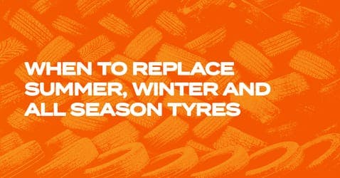 The article title over several tyres leaning against one another, with an orange overlay.