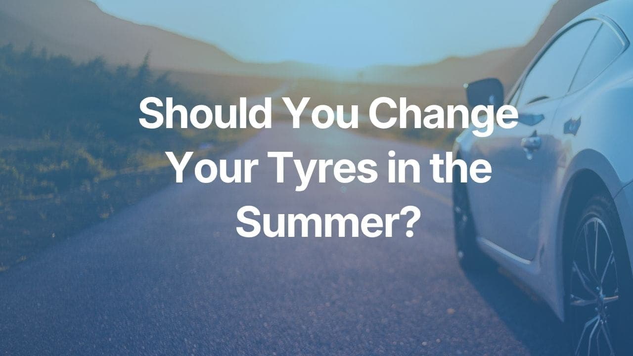 The article title over a car being driven in the sun.