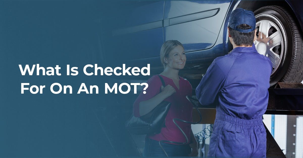 The article title over a mechanic standing next to a raised car, talking to a smiling customer.