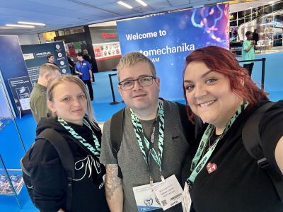 Owners of J Petty Motors posing at Automechanika industry event