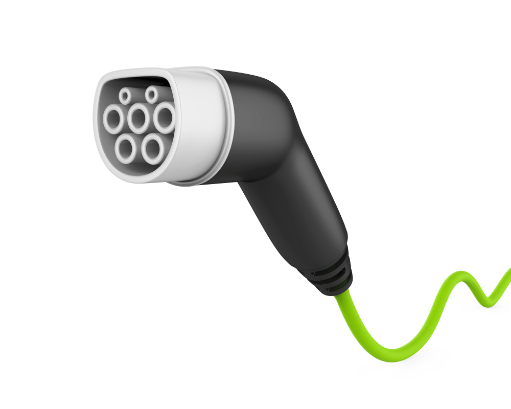 Standard electric car charging cable on white background. It looks like a chunky fuel pump with 7 circular connectors in an oval pattern.