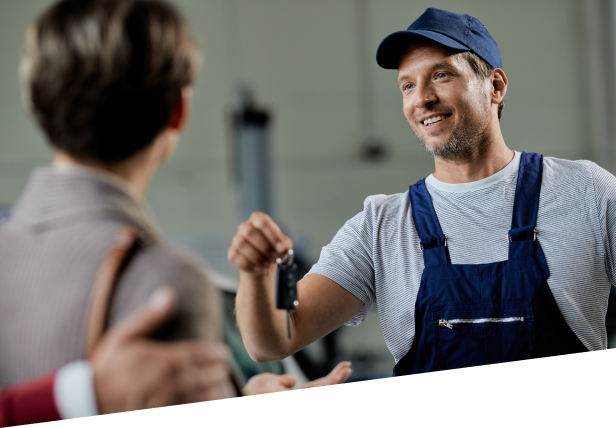 Man handing key to woman